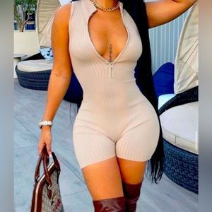 Solid zipper up sleeveless romper